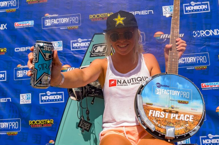 A woman on the Rockstar Stage, benefiting from TCB's Beverage Logistics