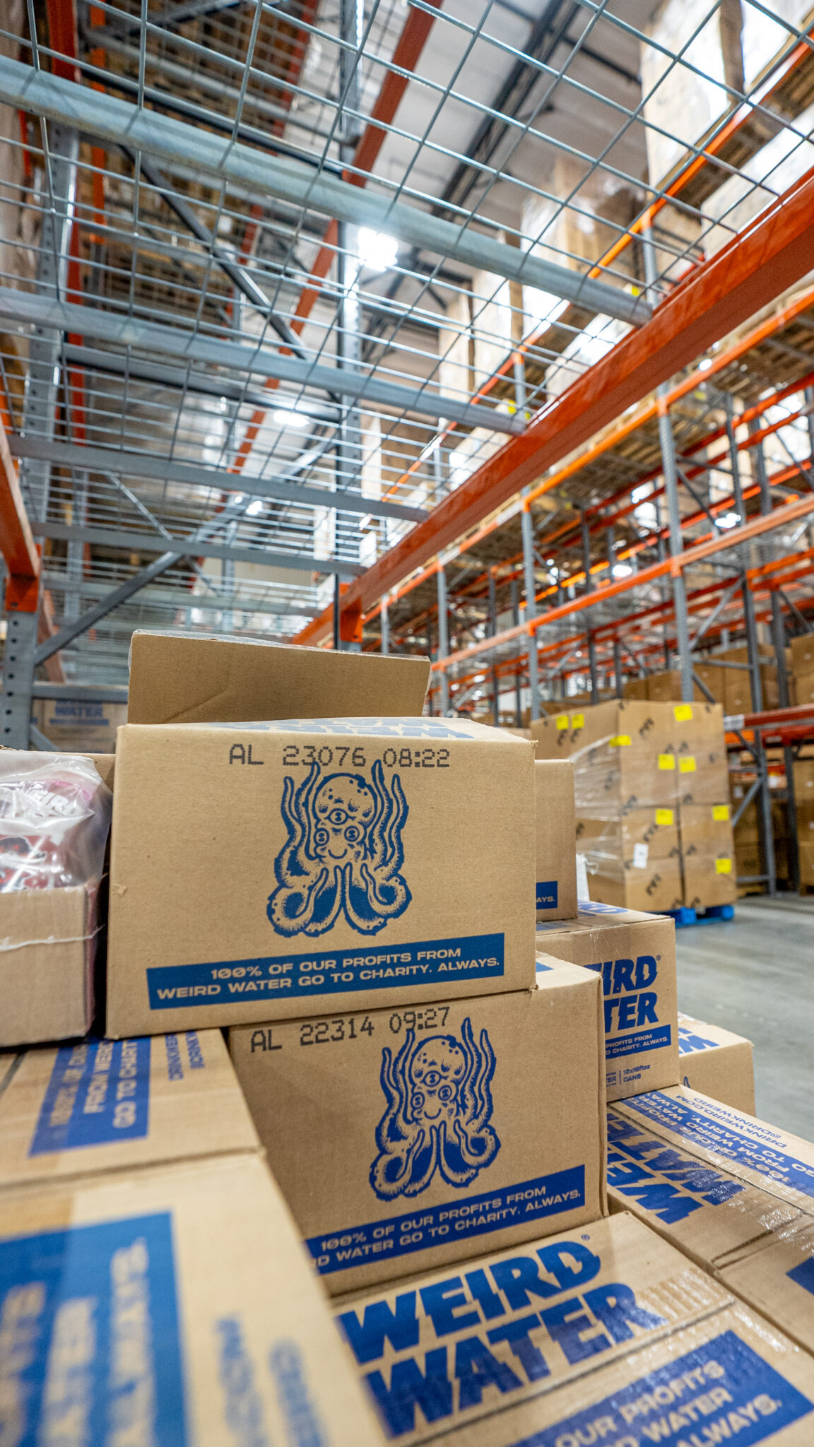 Weird Water boxes in a warehouse, in need of beverage 3pl for non-standard packaging