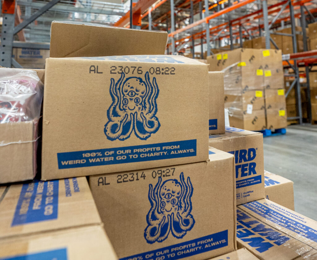 Weird Water boxes in a warehouse, in need of beverage 3pl for non-standard packaging