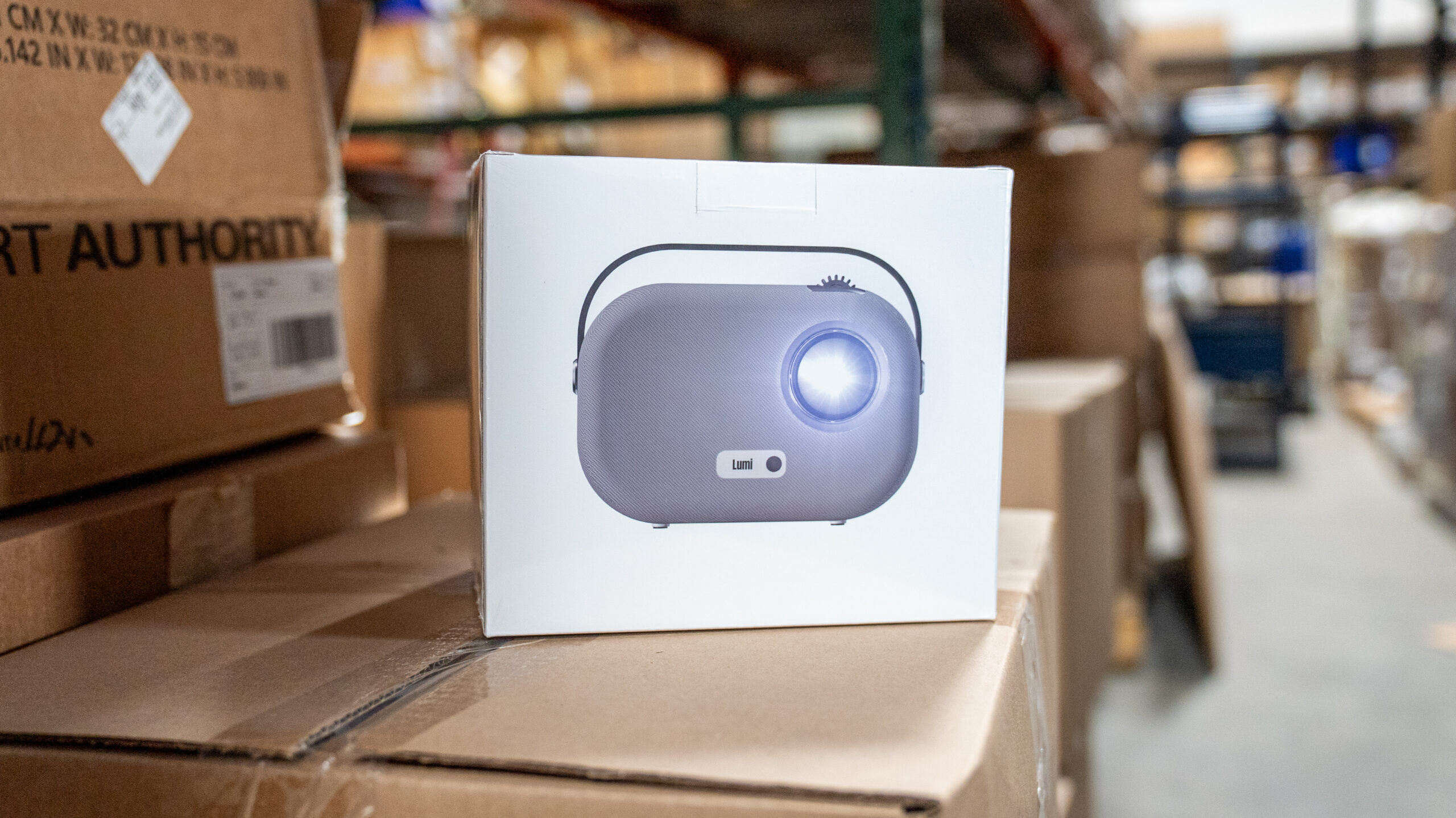A Lumi Projector in its custom packaging, ready for 3pl delivery