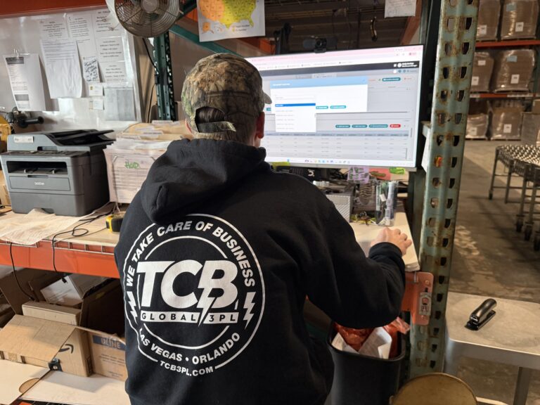 A TCB Employee working on supply chain management.