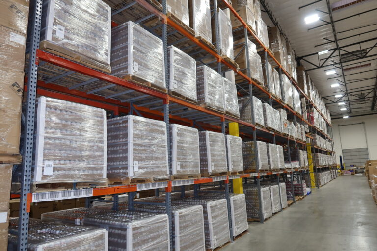 A wall of pallets in our TCB warehouse, helping our clients with 3PL Cost Savings