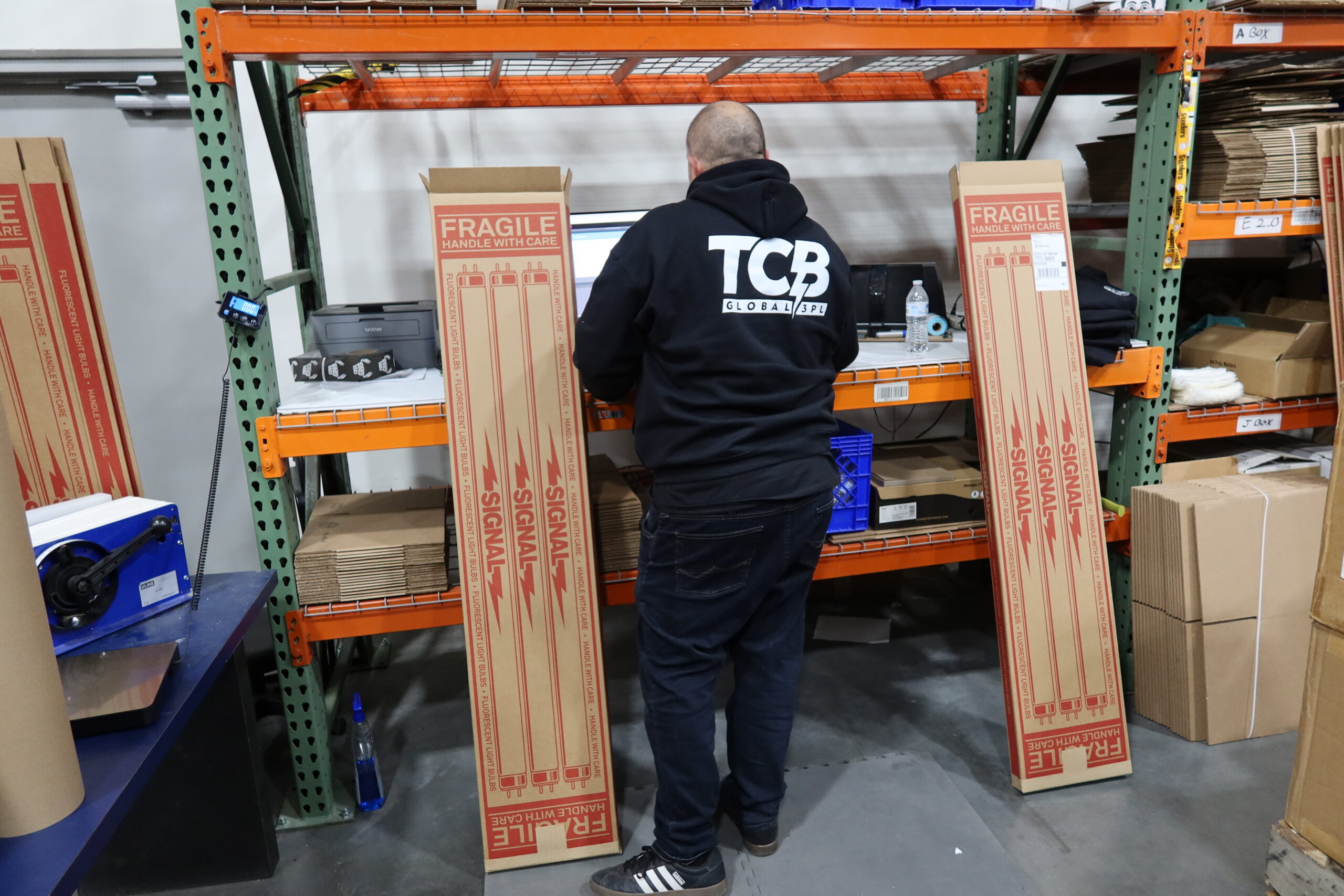 A TCB worker working to prevent fulfillment delays